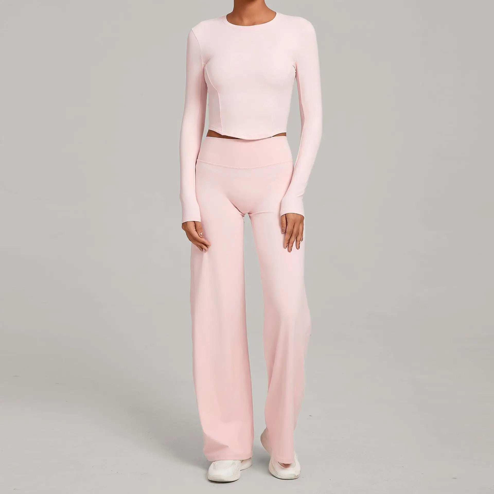 Figurbetontes -sport Set für Damen: Langärmeliges Crop-Top & ausgestellte Hose mit hoher Taille