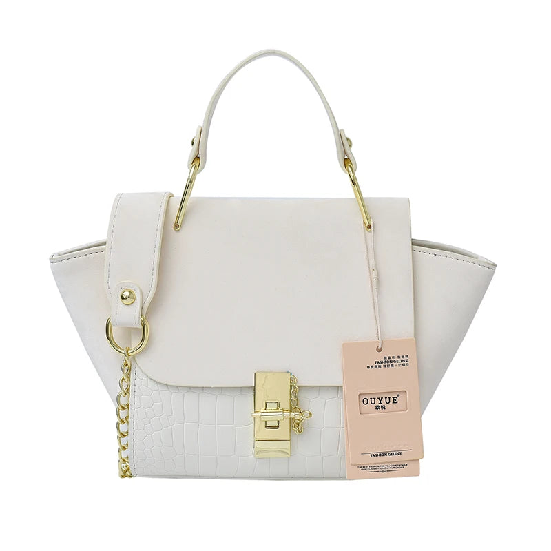 Modische Damenhandtasche in Flügelform (2026) mit drehbarem Verschluss – hochwertige Luxus-Umhängetasche im Krokodilleder-Look